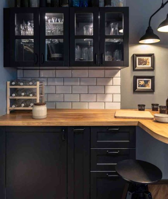 modern-kitchen-with-black-cabinets-wooden-countertop-cozy-home-bar (1)